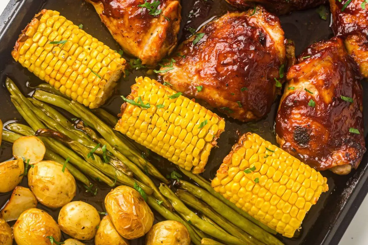 Sheet Pan BBQ Chicken Thighs with Potatoes Green Beans Corn