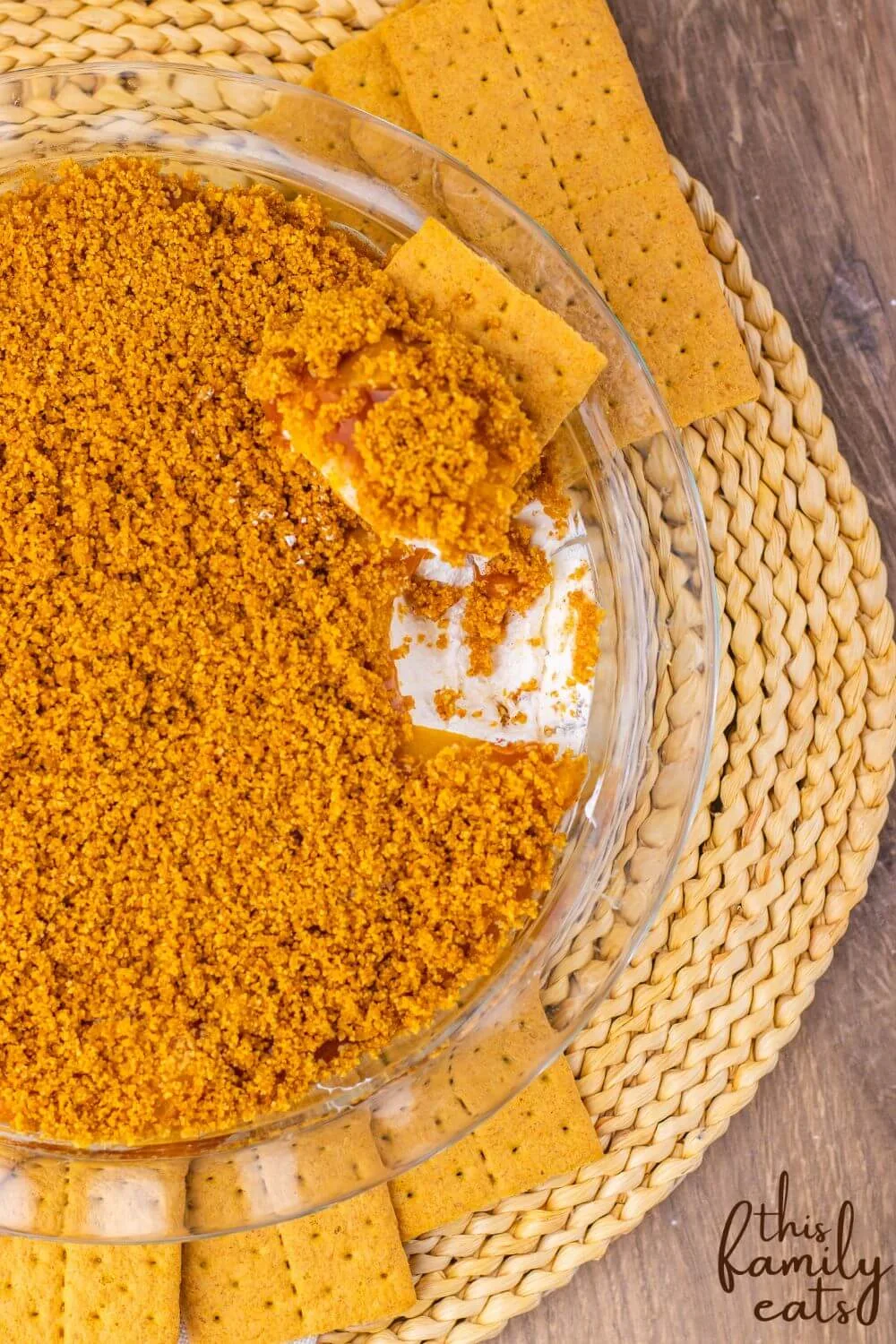 Easy no bake peach cheesecake dip with graham cracker.