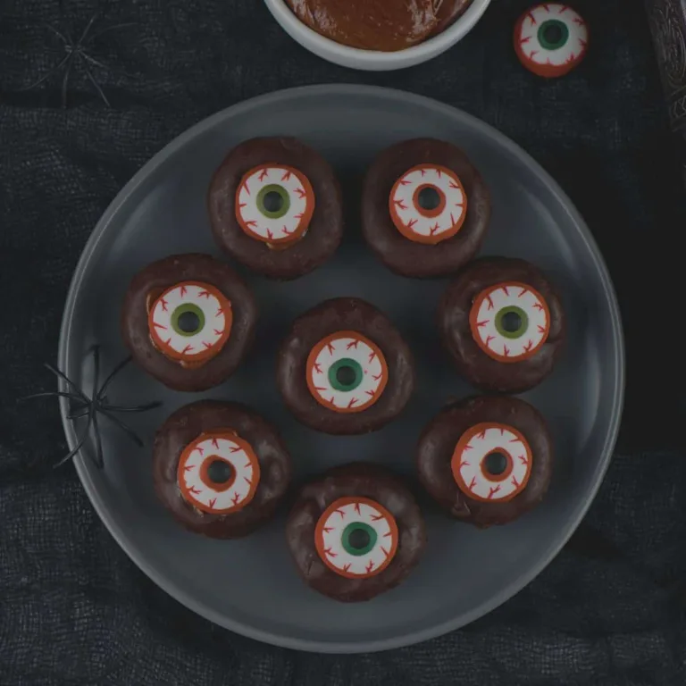 Plate of min eyeball donuts for Halloween.
